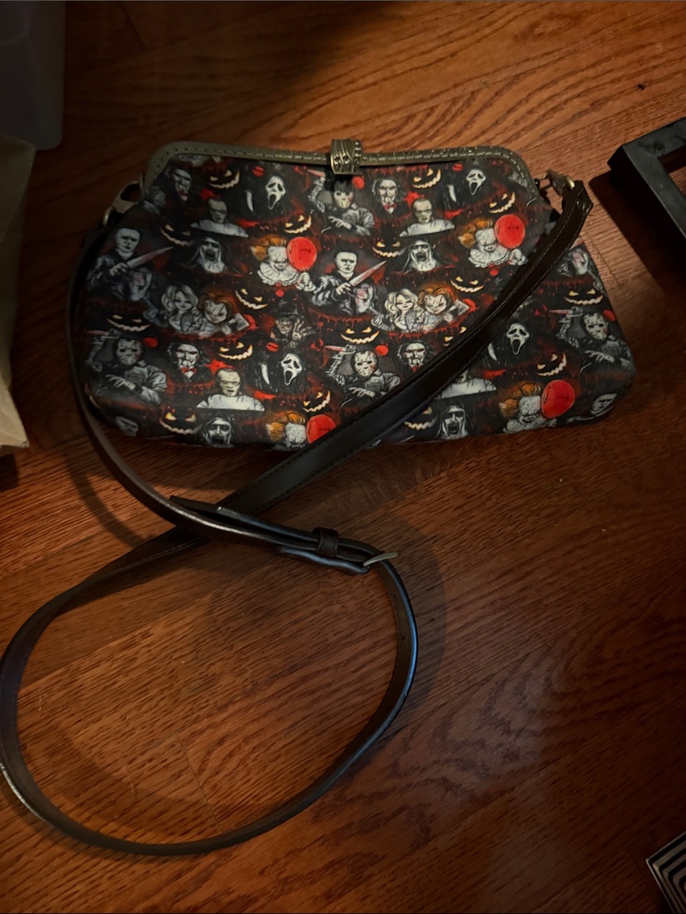 Horror Print Crossbody Bag in Black with Orange Accents